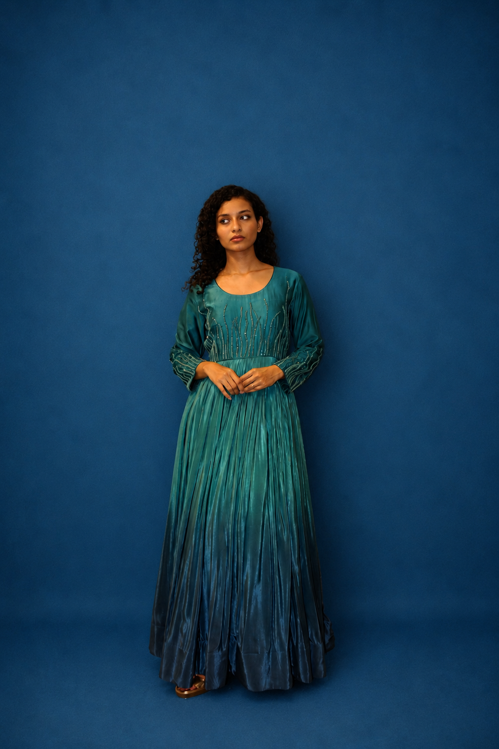 DINI'S EMERALD ECLIPSE GOWN