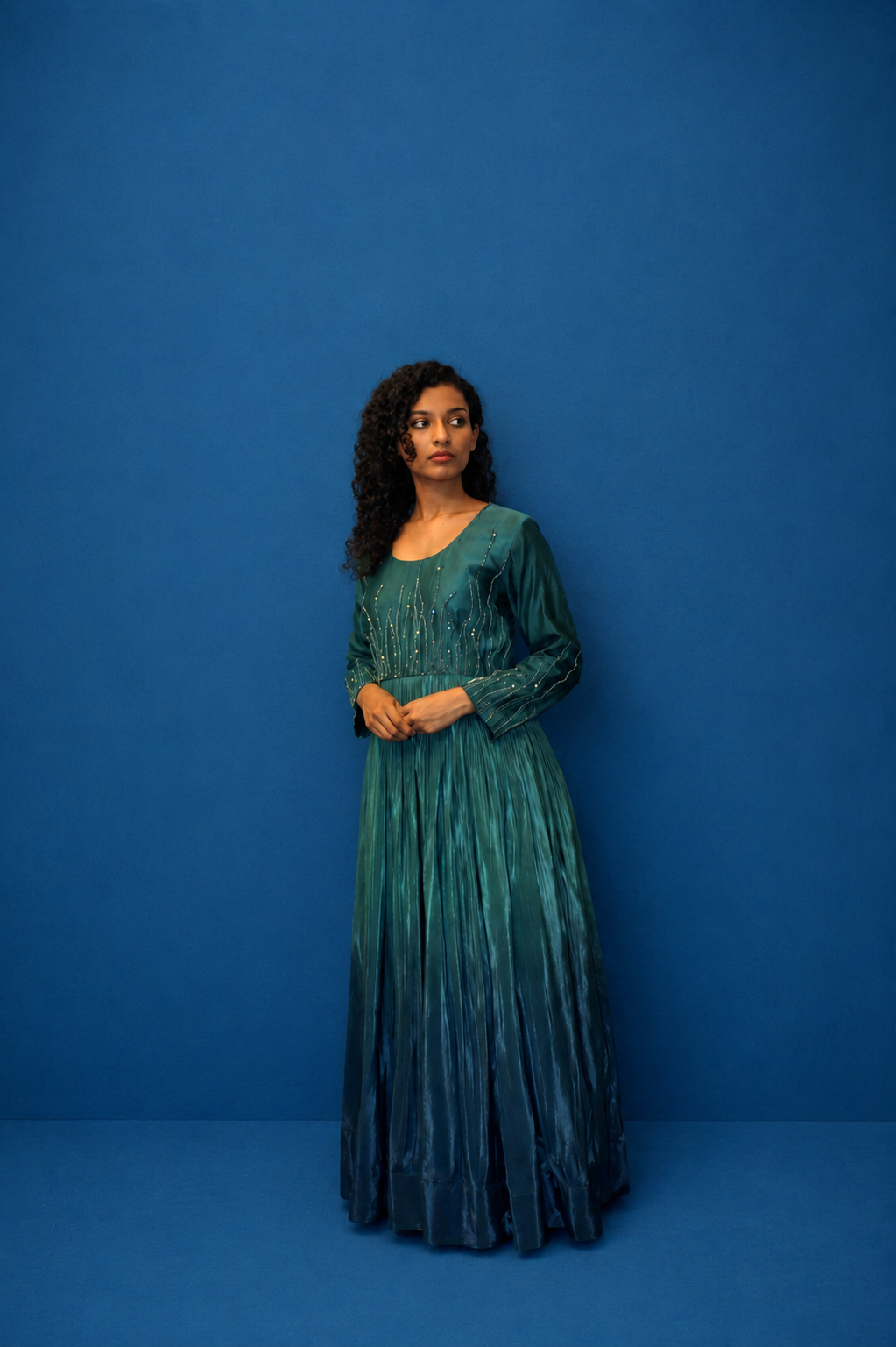 DINI'S EMERALD ECLIPSE GOWN